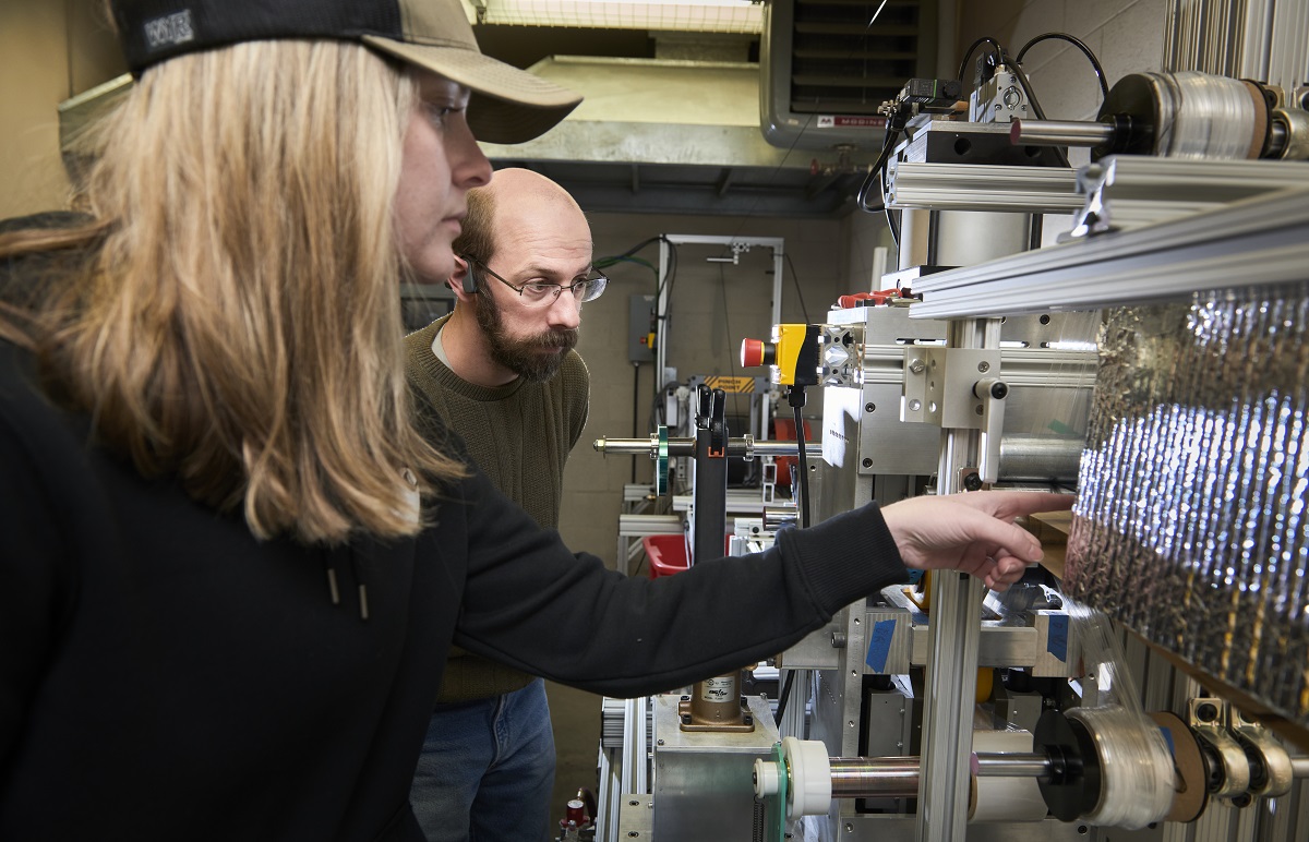 Bobcat Machine being operated by SBCF student and Research Engineer