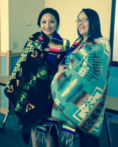 two nurses receiving their blanket