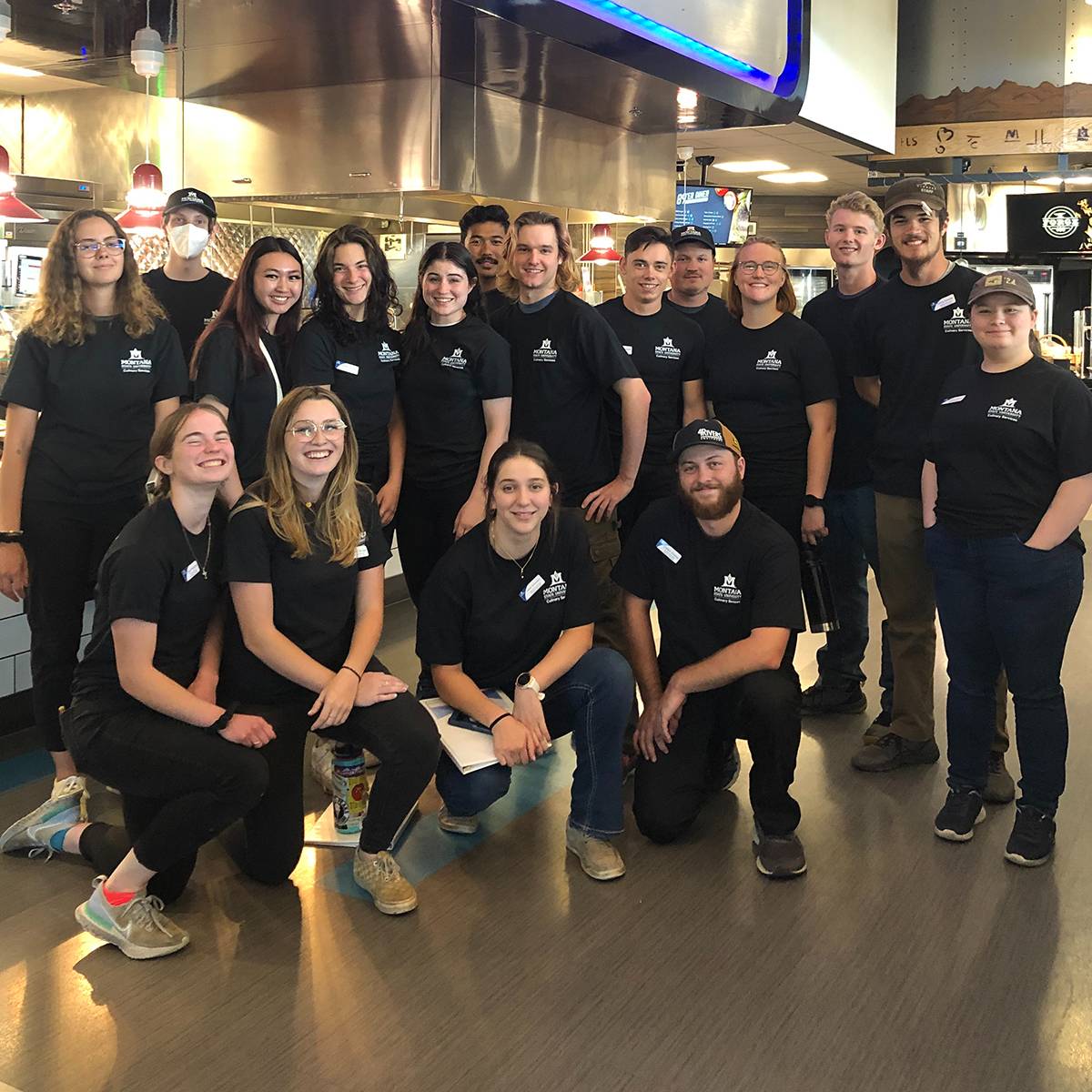 group of student employees smiling