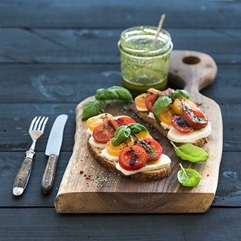 bruschetta on a wooden platter