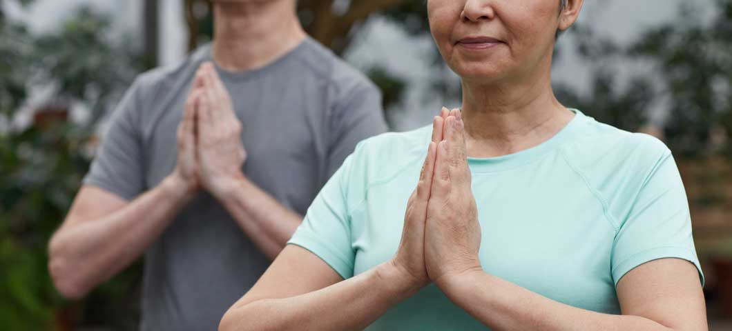 Senior adults doing yoga