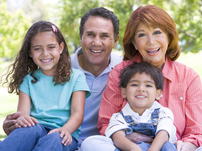 grandparents with children on laps