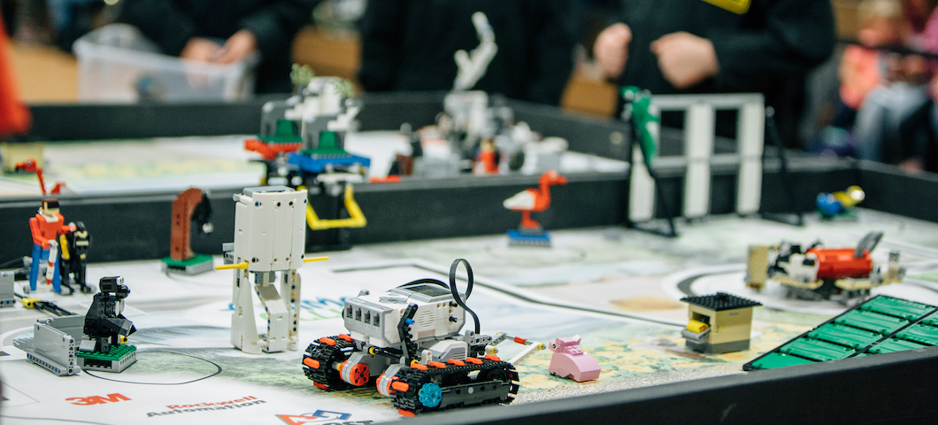 FIRST Lego League tournament robots on table