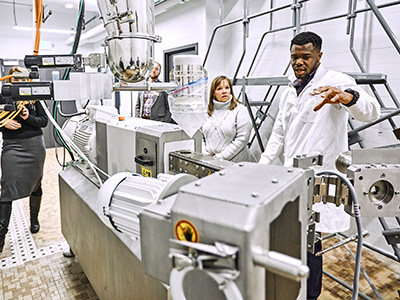 Grad student Edwin Allan giving a tour of the MSU Food Extrusion Unit