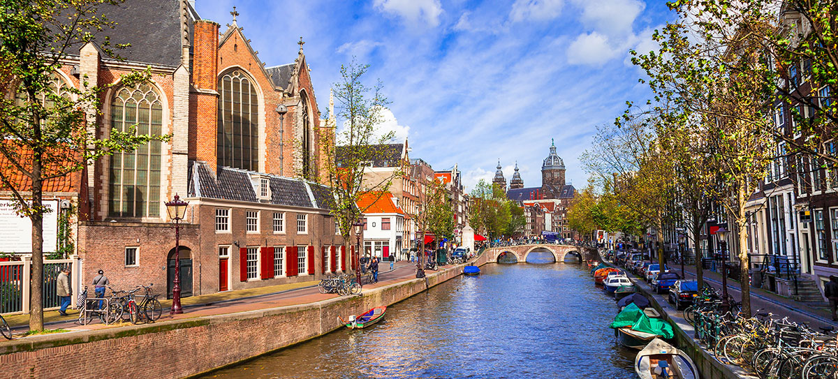 A canal in Amsterdam, Holland with boats
