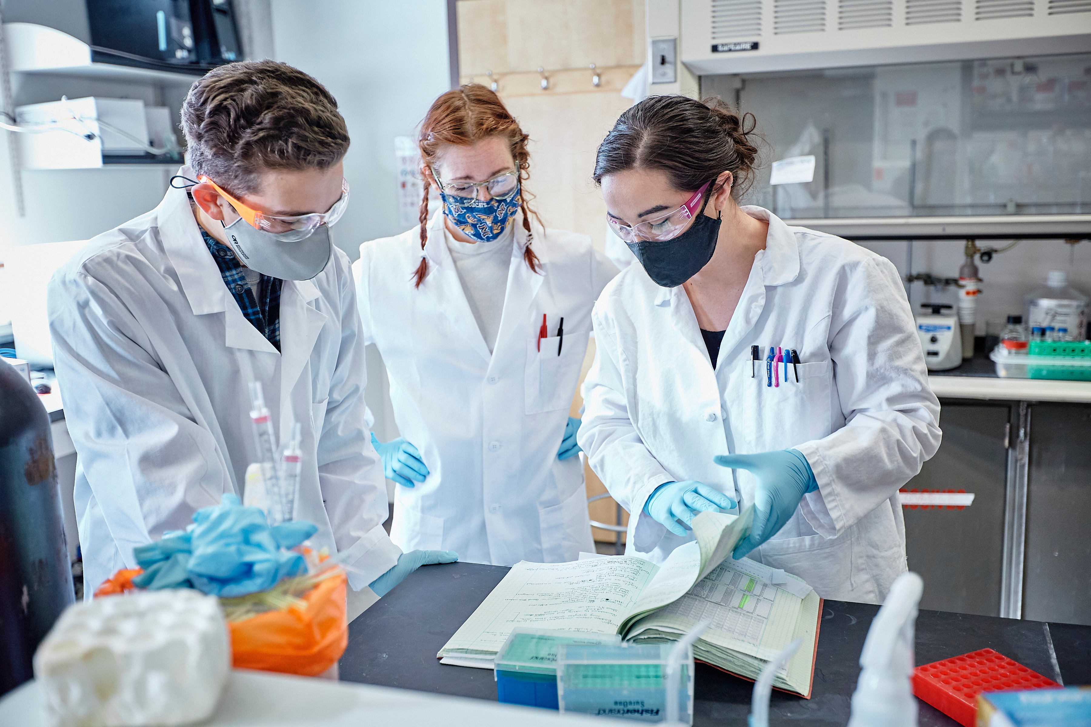 Three people in lab