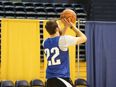 Man shooting a basketball